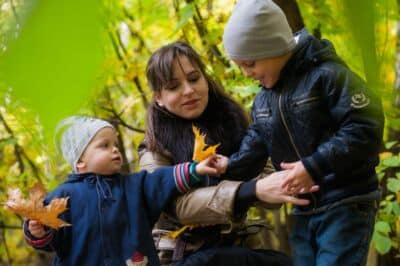 mother and children in nature