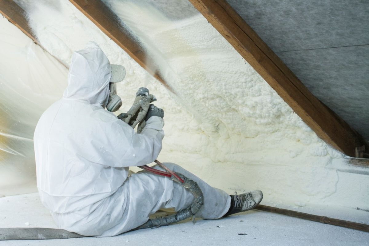 spray closed cell foam insulation being installed